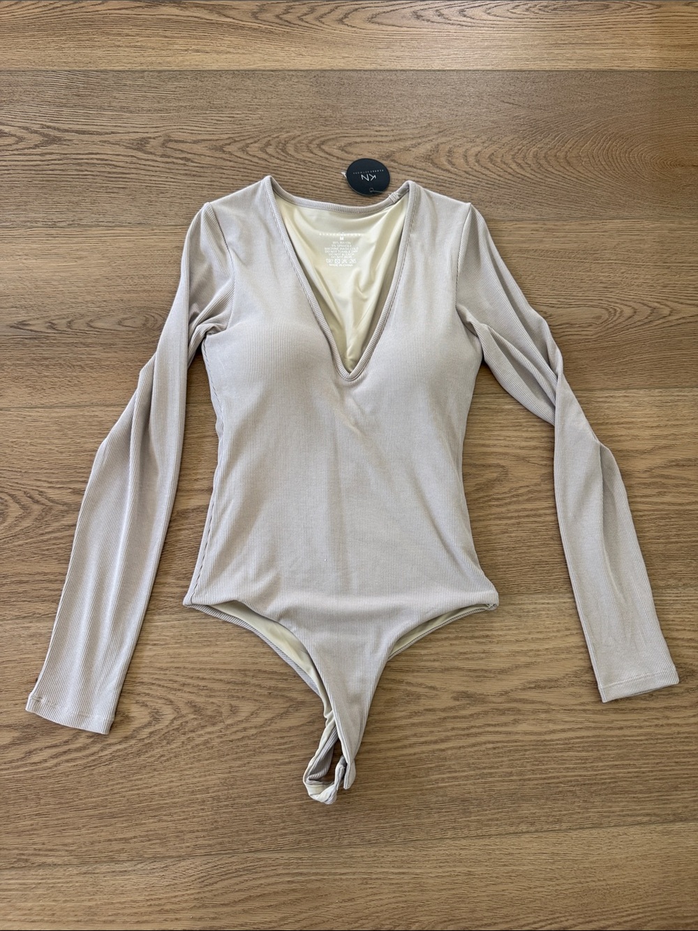 Long Sleeve V-Neck Bodysuit in Light Beige medium NWT